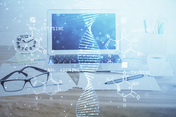 Desktop computer background and DNA drawing. Double exposure. Science concept.