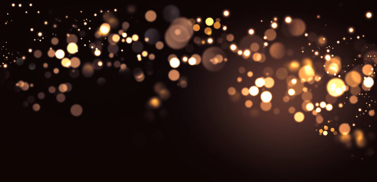 Abstract defocused golden bokeh sparkle glitter lights background. Merry Christmas and happy New Year greeting card.