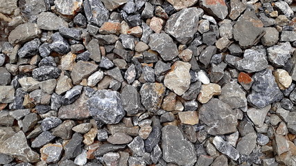Big stone floor texture photo at the park, with colorful stones copy space in countryside, Thailand