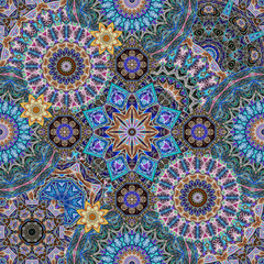Luxurious seamless pattern with mandalas and stylized lotus flowers. Carpet, hawl, shawl in ethnic style.