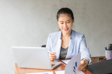 Business asian woman working at home with online technology