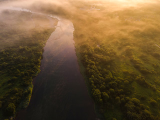 Magical Sunrise over Dunajec River in Poland. Fog Over Forest. Drone View