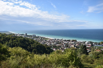 view of the sea from the top of the hill