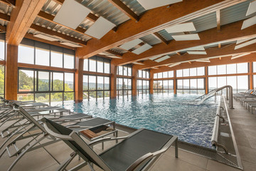 Indoor swimming pool in hotel spa and wellness center