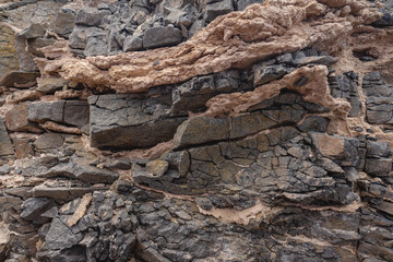 Geological sediments. Natural stone background.