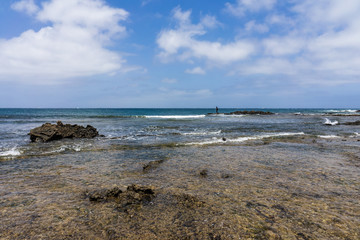 Fototapeta na wymiar Rocky Atlantic coastline at low tide. Fuerteventura. Canary Islands. Spain.