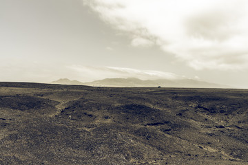 Natural landscape. The rocky and desert expanses of the Jandia Peninsula. Fuerteventura. Canary Island. Spain. Stylization. Toning.