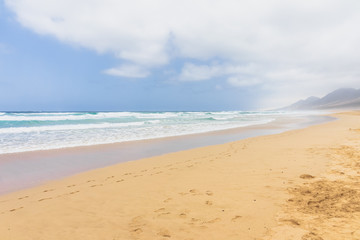 The wide and empty Cofete beach on Jandia Peninsula. Fuerteventura. Canary Islands. Spain.