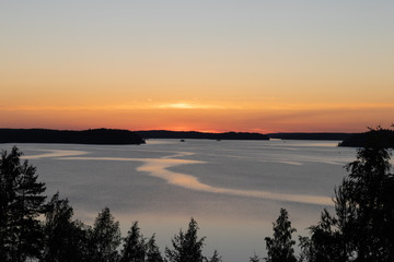 Colorful summer sunset over a lake in Lappeenranta, Finland 