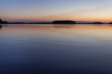 Late summer time sunset on the lake in Lappeenranta, Finland