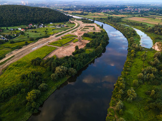 Naklejka premium Vistula River and Riverside near Cracow at Sunrise. Aerial Drone View