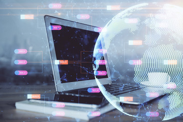 Multi exposure of table with computer and world map hologram. International data network concept.