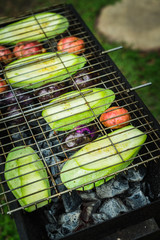 Vegetables grilling on the brazier. Selective focus. 