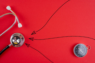 Stethoskop mit Pfeilen zeigen den Weg zum Ziel