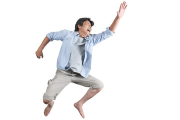 元気に飛び上がる中年男性