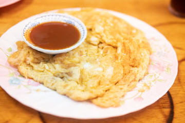 Crispy fried white crab meat omelette served with hot chili sauce