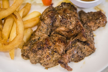 Pork steak set with black pepper sauce served with potato and some vegetable