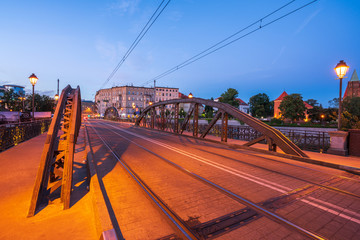 Wroclaw, Poland August 5, 2020; Cityscape of Wrocław at dusk on the Odra River.