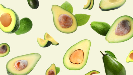 Fresh ripe avocados falling on white background, banner design