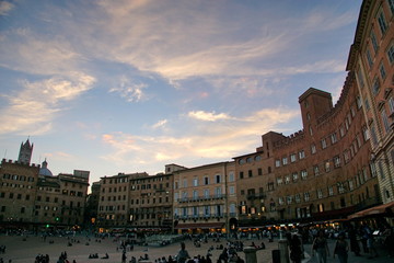 Old buildings in Piazza del Campo panorama view in Siena, Italy.