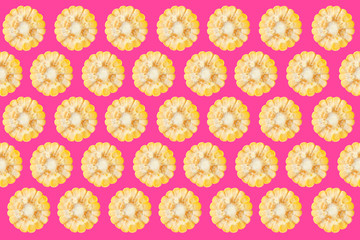Collage with corn cob pieces on pink background, pattern design