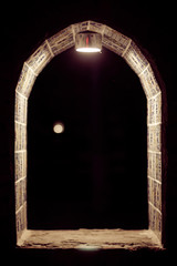 A beautifully decorated window with illumination near the Uzbek restaurant, the city of Yarovoe (Altai Territory).