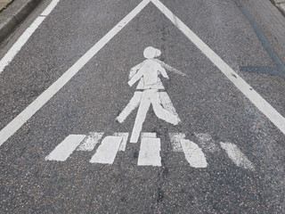 doppelganger or double: warning sign at a crosswalk