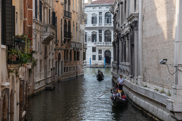 Venice is a city on an island in the Adriatic Sea, in the Venetian lagoon. A city with many canals and bridges with the main Grand Canal and the largest St. Mark's Square