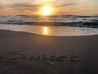 zachód słońca plaża piasek fale morze Bałtyk Morze Bałtyckie słońce napis na piasku  sunset sand beach sun tide baltic sea © GregStu