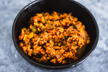 plant-based food, vegan rice and quinoa with mixed vegetables