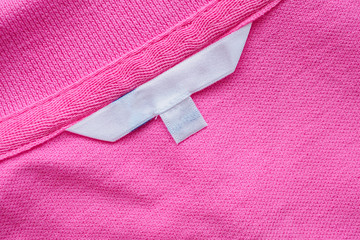 Blank white clothes label on new shirt