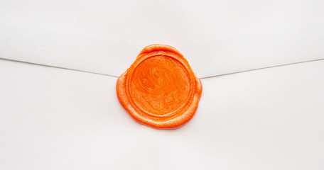 Wax seal stamp on white letter paper background
