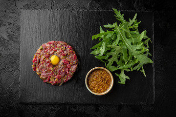 Beef, cappers, mustard and quail egg tartare