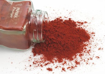 Paprika Powder, capsicum annuum against White Background