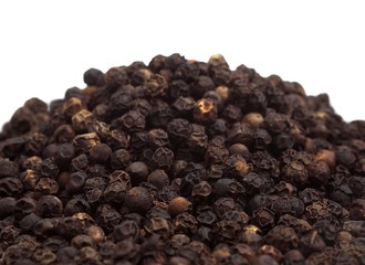 Black Peppercorn, piper nigrum against White Background