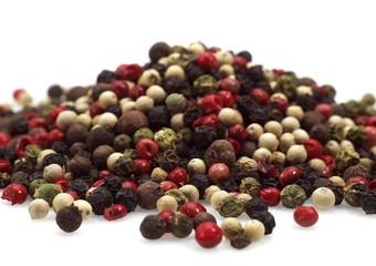 Five Peppercorns, peper nigrum against White Background