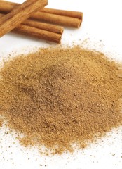 Cinnamon Bark and Powder, cinnamomum zeylanicum against White Background