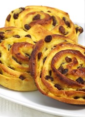 Pain au Raisin, Sweet bread against White Background