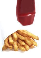 French Fries with Tomato Sauce against White Background
