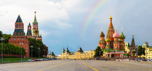 Rainbow over Red Square in Moscow after a thunderstorm, panoramic view. Moscow Kremlin, St. Basil's...