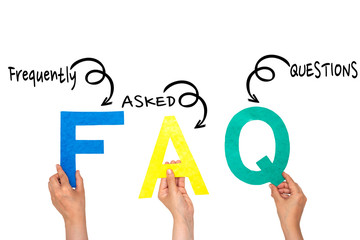 forming FAQ ( frequently asked questions ) with hands holding alphabets