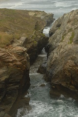 Fototapeta premium Sunrise over the dramatic Playa de las Catedrales aka As Catedrais Beach in beautiful Galicia in Northern Spain