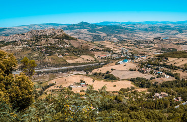 Fototapeta na wymiar Panorama of Sicilian landscapes with the amazing medieval stone town of Leonforte on the hill in the province of Enna, Sicily, Italy