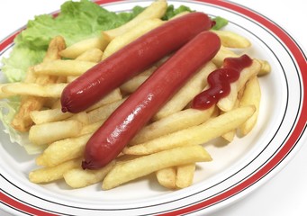 Sausages, French Fries and Tomato Sauce in a Plate