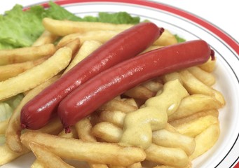 Sausages, French Fries and Moutarde in a Plate