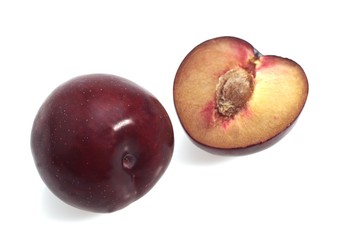Red Plums against White Background
