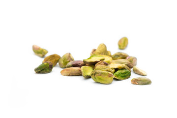 Peeled pistachios with white background