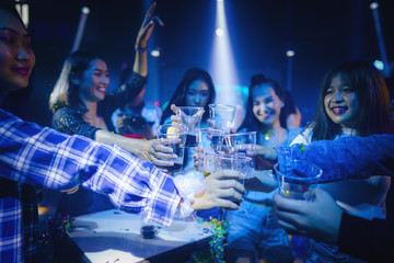 group of young people have fun enjoy party and dancing in night club