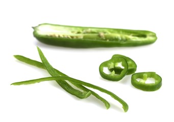 Green Chili Pepper, capsicum annuum against White Background