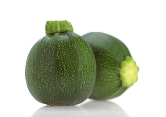 Round Courgette or Zucchini, cucurbita pepo against White Background
